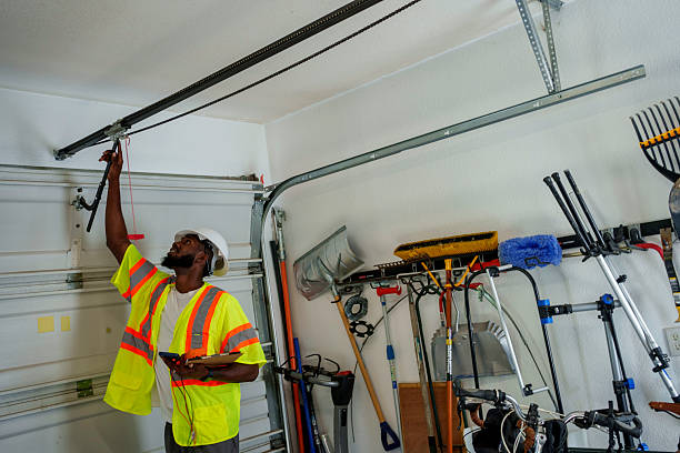 Professional Garage Door Panel Replacement technician working in Chouteau, OK