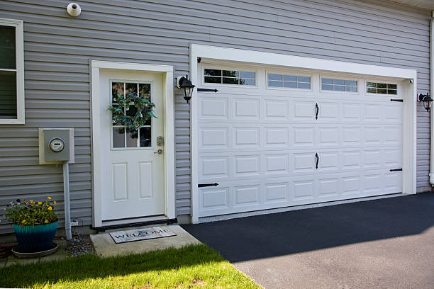 24/7 Emergency Garage Door Panel Replacement experts in Chouteau, OK